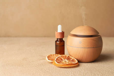 Aroma oil diffuser on color backgroundの写真素材