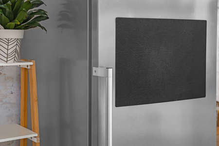 Chalkboard on door of modern refrigerator in kitchenの写真素材
