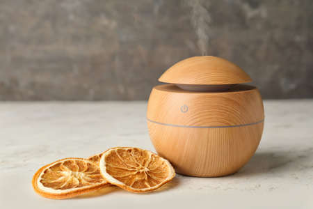 Aroma oil diffuser on gray backgroundの写真素材