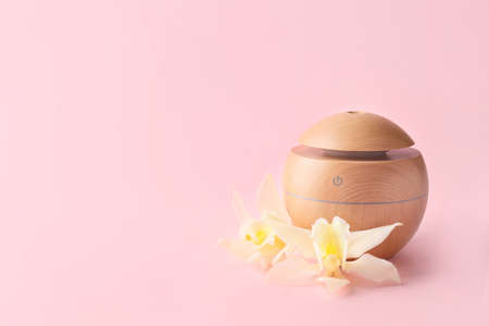 Aroma oil diffuser on color backgroundの写真素材