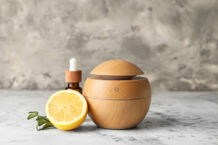 Aroma oil diffuser on gray backgroundの写真素材