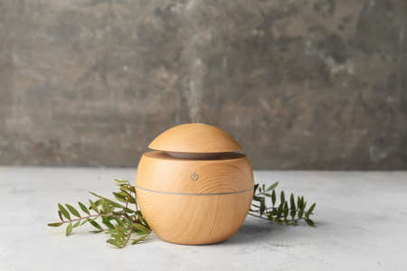 Aroma oil diffuser on gray backgroundの写真素材