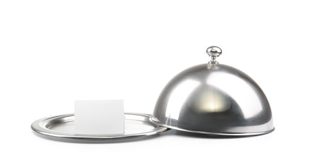 Tray and cloche with blank paper sheet on white backgroundの写真素材