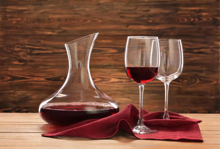 Glassware of tasty wine on tableの写真素材