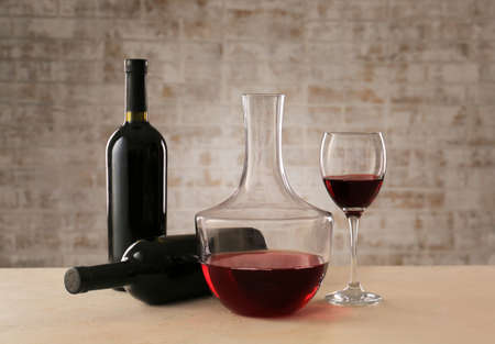 Glassware of tasty wine on tableの写真素材