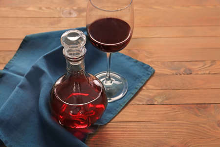 Glassware of tasty wine on tableの写真素材