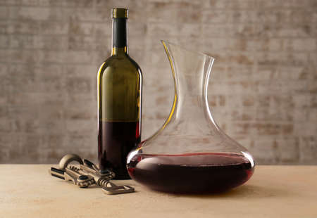 Glassware of tasty wine on tableの写真素材