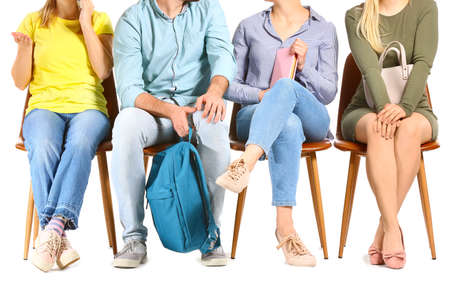 People waiting in line on white backgroundの写真素材