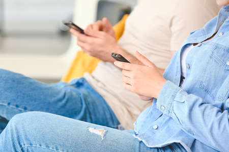 Patients waiting for their turn in hall of clinic, closeupの写真素材