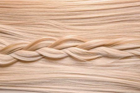 Healthy blonde hair as backgroundの写真素材