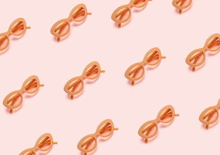 Many sunglasses on color backgroundの写真素材