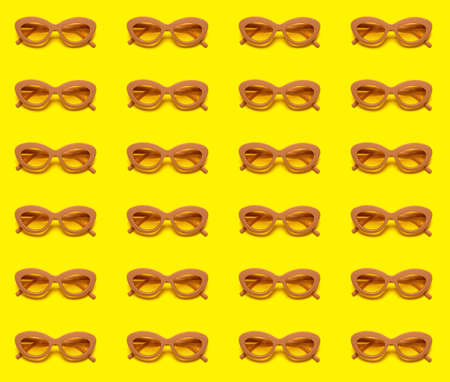 Many sunglasses on color backgroundの写真素材