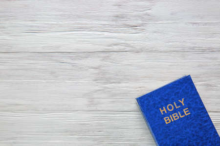 Holy Bible on wooden backgroundの写真素材