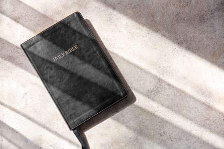 Holy Bible on gray background