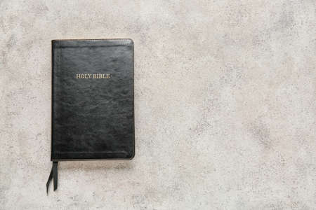 Holy Bible on gray background