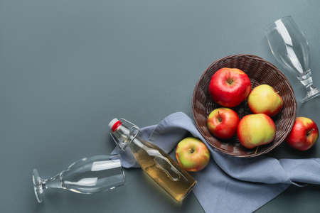 Composition with fresh apple cider on gray backgroundの写真素材