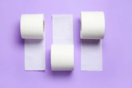 Rolls of toilet paper on color backgroundの写真素材