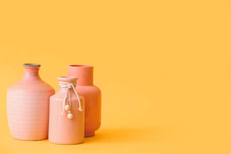 Different vases on color backgroundの写真素材