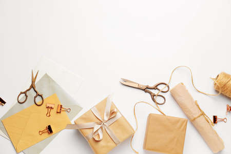 Gift boxes with supplies on white background