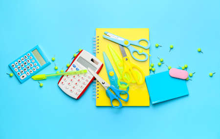 School supplies on color background
