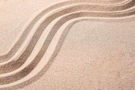 Texture of sand with lines. Zen concept