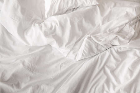 Clean linen on big bed