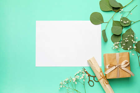 Composition with blank card on color background