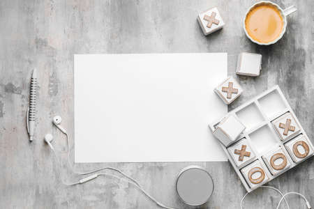 Composition with blank card on gray background