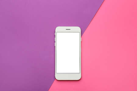 Modern mobile phone on color background