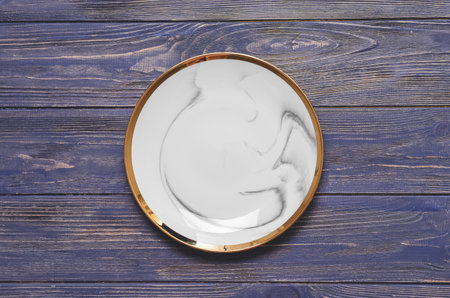 Clean plate on wooden backgroundの写真素材