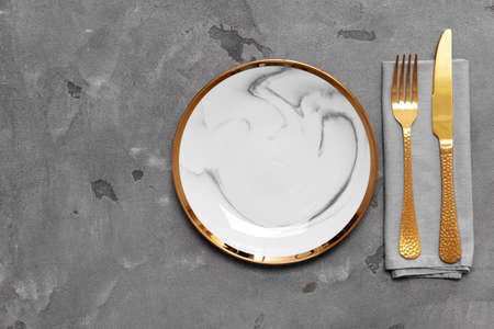 Simple table setting on gray background
