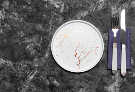 Simple table setting on dark backgroundの写真素材