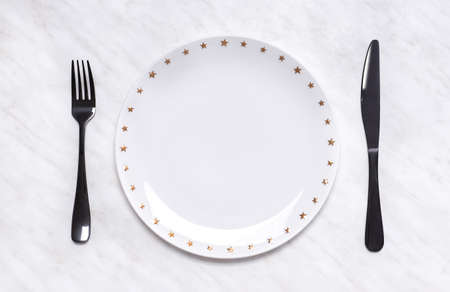 Simple table setting on light backgroundの写真素材