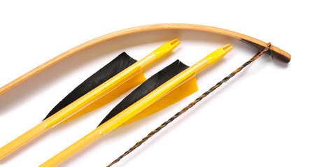Arrows and bow for archery on white background, closeup