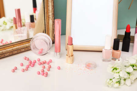 Makeup cosmetics on table in dressing roomの写真素材