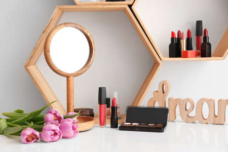 Makeup cosmetics on table in dressing roomの写真素材