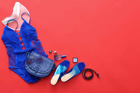 Female accessories and clothes on color backgroundの写真素材