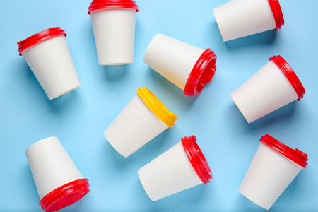 Takeaway cups for drink on color backgroundの写真素材