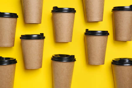Takeaway cups for drink on color backgroundの写真素材