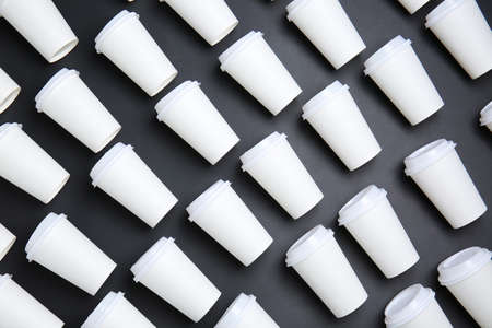 Takeaway cups for drink on dark backgroundの写真素材