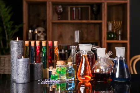 Different potions on alchemist's tableの写真素材