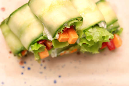 Plate with tasty cucumber rolls, closeupの写真素材