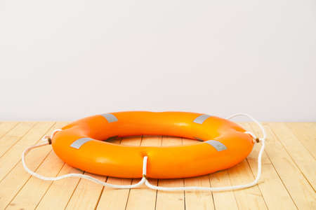 Lifebuoy ring on wooden tableの写真素材