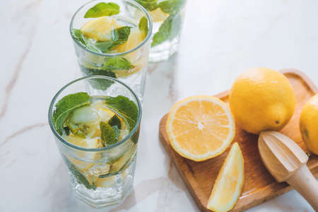 Glasses of fresh lemonade on tableの写真素材