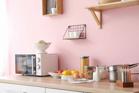 Set of utensils and products on kitchen counterの写真素材