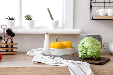 Set of utensils and products on kitchen counterの写真素材