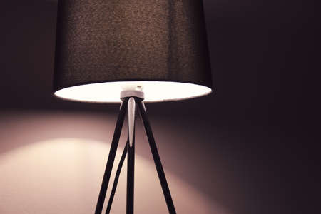 Glowing lamp on dark backgroundの写真素材