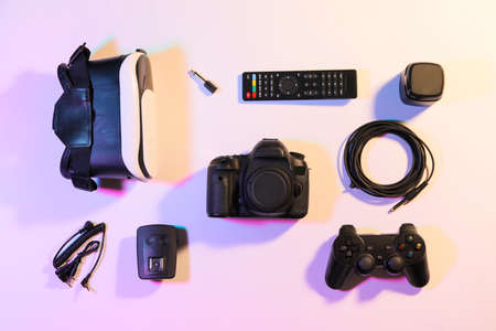 Different modern devices on color backgroundの写真素材