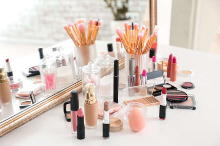 Set of decorative cosmetics on tableの写真素材