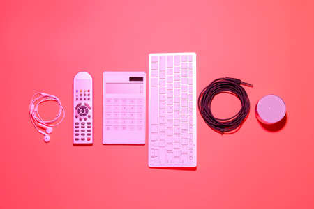 Different modern devices on color backgroundの写真素材